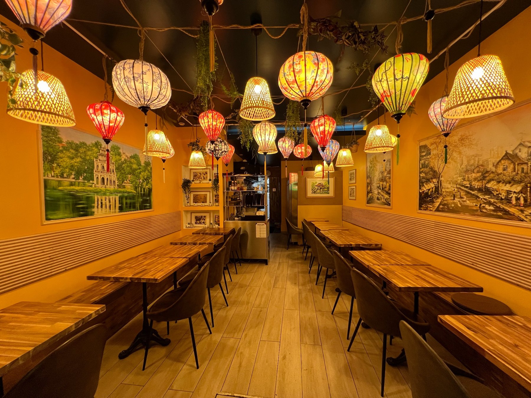 Lantern-lit dining room at Phở Hà Nội Quán